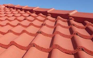 Tan Hinon tile and slate roof replacement